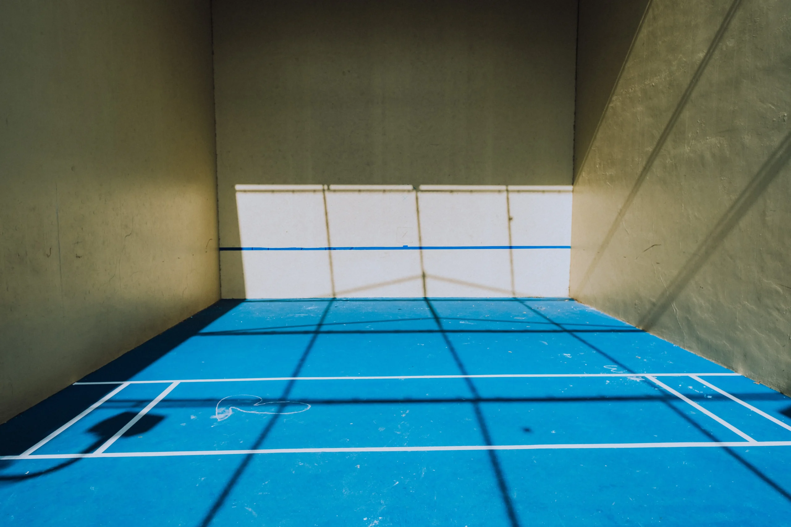 how to paint a pickleball court on concrete.